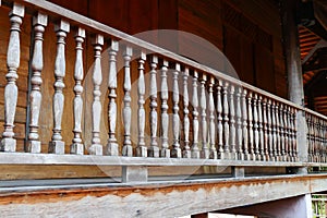 Wooden bannister of the balcony photo