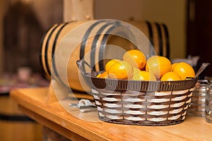 Wooden bar in a pub with a lemons in basket