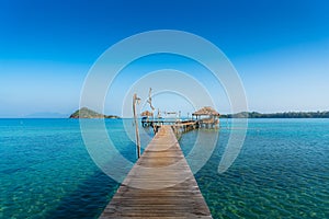 Wooden bar in sea and hut with clear sky in Koh Mak at Trat, Thailand. Summer, Travel, Vacation and Holiday concept photo