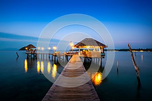 Wooden bar in sea and hut with night sky in Koh Mak at Trat, Thailand. Summer, Travel, Vacation and Holiday concept