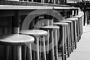 Wooden bar stools mono outdoor eatery photo