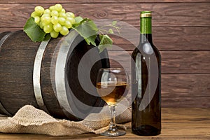 wooden barrel with bottle glass wine. High quality photo
