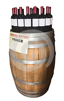 Wooden barrel with bottles of wine