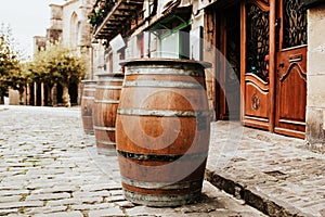 Wooden barrel table at a bar or pub in the city