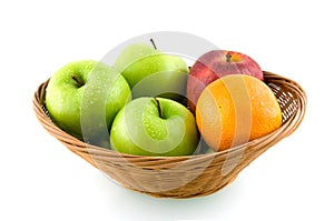 Wooden basket with mixed fruit