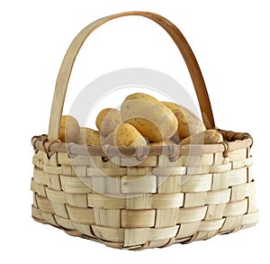 Wooden basket with potatoes