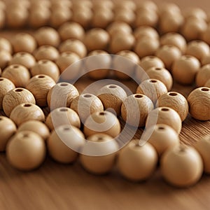 Wooden beads arranged in a deliberate pattern on a smooth wooden surface. Each