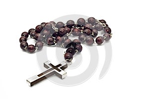 Wooden beads with metallic cross