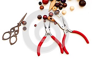 wooden beads and tools for creating fashion jewelry in the manufacturing process