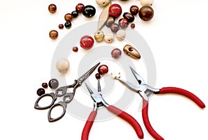 wooden beads and tools for creating fashion jewelry in the manufacturing process