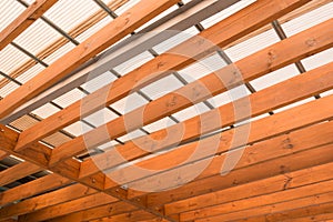 Wooden beams with fiber roof