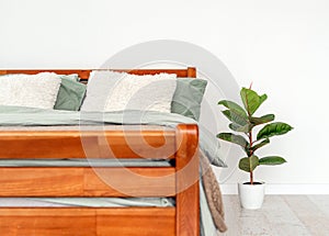 Wooden bed in interior