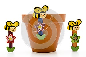 Wooden bees with flowerpot