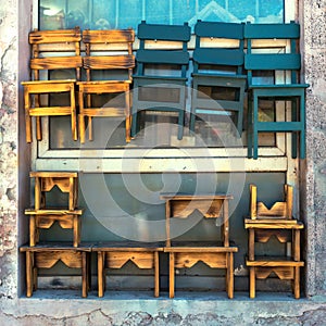 Wooden bench chairs on carpenter workShop window design