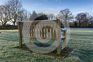 Wooden Bench in Countryside Memorial Garden