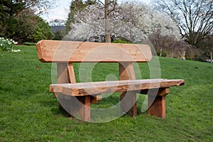 Wooden bench on grass