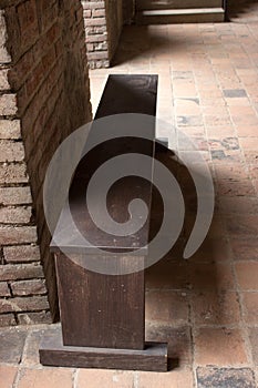 Wooden bench in the hallway of the old castle