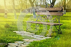 Wooden bench with iron forging pattern