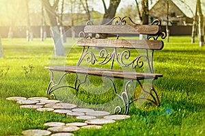 Wooden bench with iron forging pattern