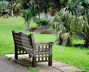 A wooden bench at the park in Singapore