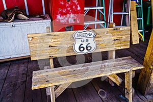 Wooden bench, Route 66, is attracting visitors from all of the world