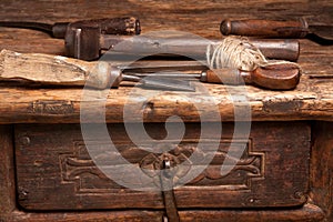 Wooden bench and rusty tools