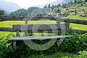 Wooden bench in val passiria photo