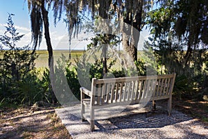 Wooden bench with a view of coastal marsh lands