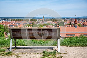 Wooden bench with view of old town from above in Bamberg, Germany