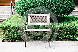 Wooden benches against the background of green grass benches are set as seating