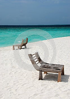 Wooden benches on beach