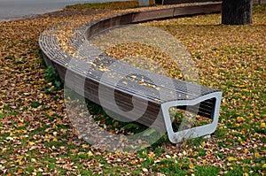 wooden benches by the lawn. wood paneled entice you to sit down