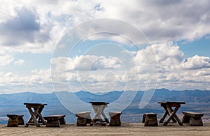 Wooden benches and tables in the mountains