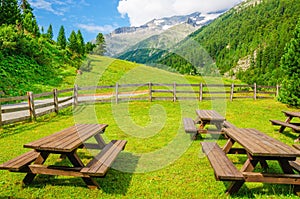 Wooden benches for visitors' picnic, Austria, Alps