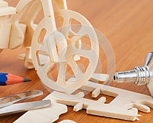 Wooden bicycle toy - woodcraft construction kit photo