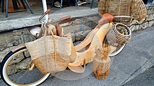 Wooden bicycle with wickerwork baskets