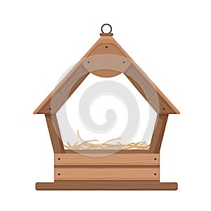 Wooden birdhouse with nest. Comfortable house frame for birds from wooden planks.