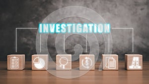 Wooden block on desk with investigation icon on virtual screen