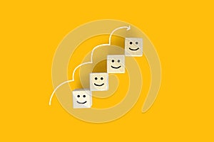The wooden block has an emoticon for customers to assess their satisfaction with the service, copy space for advertising images. photo