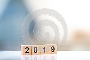 Wooden block number of year 2019 for business and graphic design