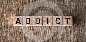 Wooden Block Spelling the Word Addict