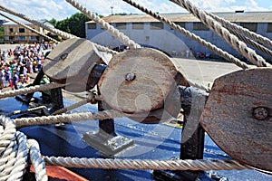 Wooden blocks as part of rigging on the ship.