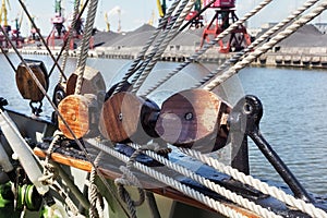 Wooden blocks as part of rigging.