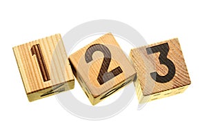 Wooden blocks with digits 123