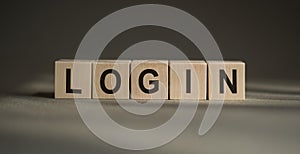 Wooden blocks with the inscription LOGIN on a gray background