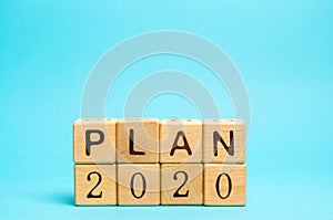 Wooden blocks with the inscription Plan 2020. The concept of achieving business goals. Execution of a business plan.