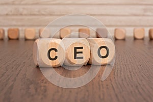 wooden blocks with the letters ceo on them