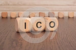 wooden blocks with the letters ICO on them