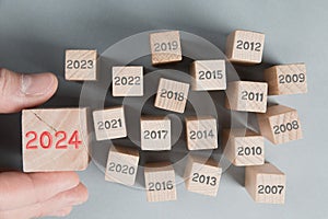 Wooden Blocks with New Year 2024.