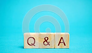 Wooden blocks Q&A  question and answer concept. Communication, brainstorming, business. Search for information. Ask for an